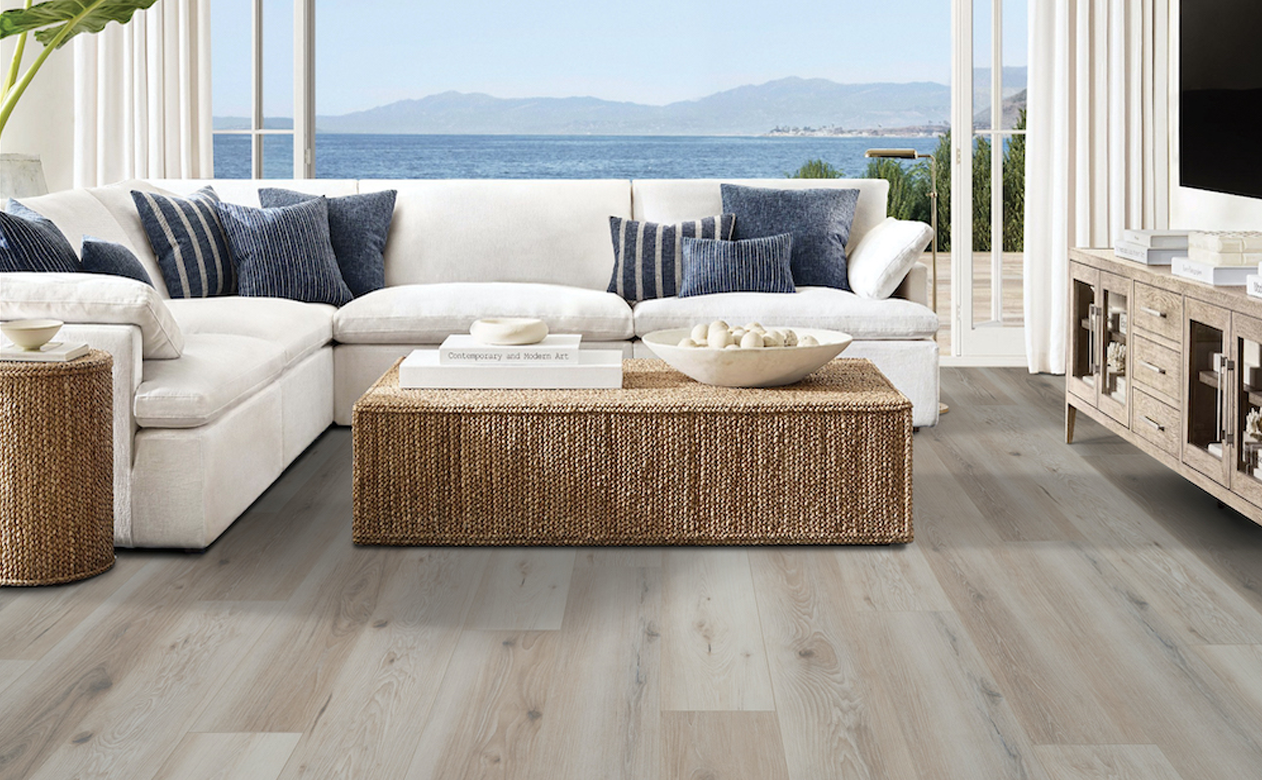 light colored weathered wood look laminate flooring in livingroom