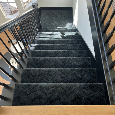 Luxury stair runner with custom binding installed by Carpet One Floor & Home
